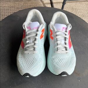 New Balance Women's Mint Green Mesh Sneakers with Neon Pink Accents